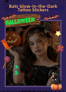 Luminous Halloween bat temporary tattoo on a child's arm glowing in the dark