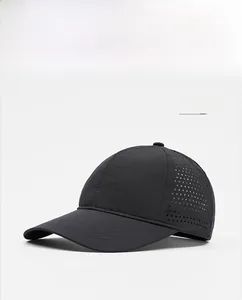 Detail of dark grey breathable sports cap showing laser-cut side ventilation holes