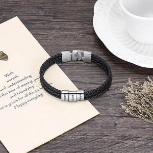 Mens triple-layer black braided leather bracelet with custom engraved stainless steel beads