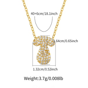 Detail view of gold-plated letter T pendant with zircon inlay and exact dimensions