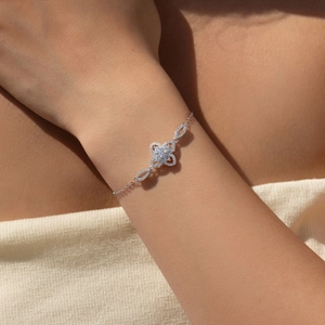 Elegant S925 sterling silver flower bracelet with sparkling cubic zirconia on female wrist
