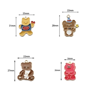 Set of four cute cartoon bear enamel charms in various sizes for DIY jewelry crafting