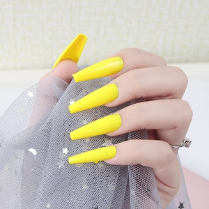 Glossy lemon yellow long coffin press-on nails with shiny UV top coat for women