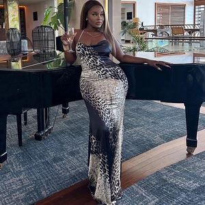 Elegant leopard print backless maxi dress in satin finish with halter neck design