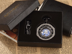 Vintage octagonal skeleton pocket watch with blue gears and chain in a premium gift box