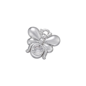 Macro view of silver butterfly pendant with micro-pave cubic zirconia inlay