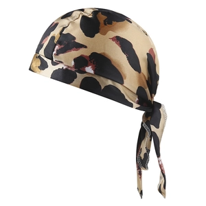 Detail showing high-quality leopard print satin fabric and stitching on a yoga durag headwear