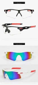 Detail of streamlined PC sports sunglasses featuring red temples and polarized mercury lenses