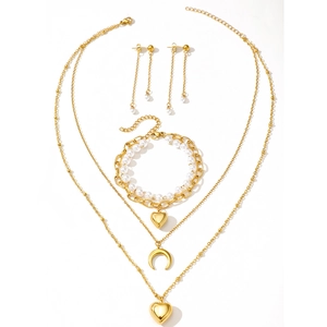 Fashionable gold layered necklace with heart and moon pendants and pearl jewelry set