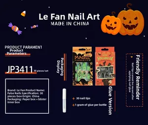 Detail of Halloween press-on nail kit with 30 pumpkin and bat themed nail pieces and glue