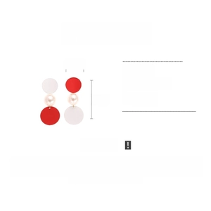 Detail view of asymmetric pearl earrings showing dimensions 2.5cm by 6cm and iron material