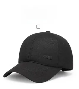 Detail view of black baseball cap showing SPORT embroidery and premium twill fabric texture