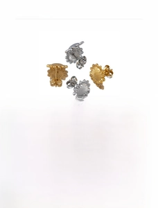 Detail of stainless steel sunflower earrings showing gold and silver finishes and texture