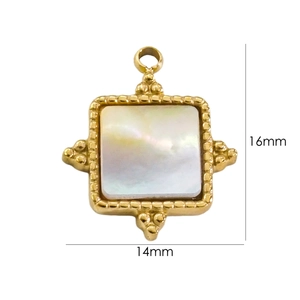 Macro shot of 14K gold-plated square pendant featuring white mother-of-pearl and beaded edges