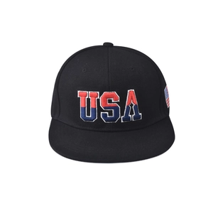 Close-up of premium USA embroidery and flag patch on black cotton baseball cap