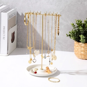 Golden metal T-bar jewelry stand with 16 hooks and white tray base for necklaces