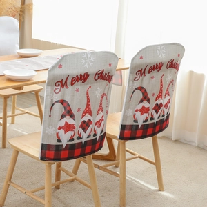 Christmas Gnome chair cover with red and black plaid edge and Merry Christmas print
