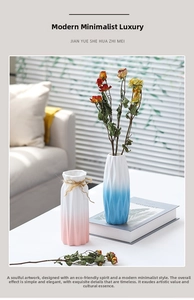 Detail of geometric ceramic vases in pastel gradients with rustic jute rope accents
