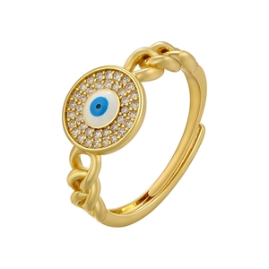 Macro shot of 18K gold plated brass evil eye ring with braided band and crystals