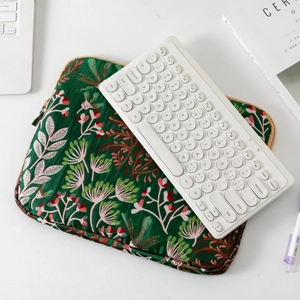 Embroidered floral laptop sleeve in dark green fabric for iPad and 13-inch notebooks