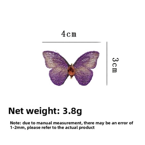 Detailed size view of an embroidered butterfly brooch with a 4cm x 3cm dimension and 3.8g weight