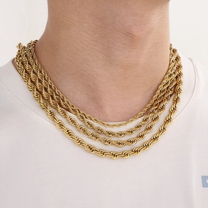 Chic 18K gold-plated twisted rope chain necklace worn by a model for a hip hop layered look