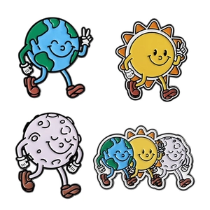 Cartoon planet enamel pins set featuring earth sun and moon designs on white background