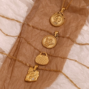 Retro 18K gold plated stainless steel necklaces featuring vintage coins and relief pendants