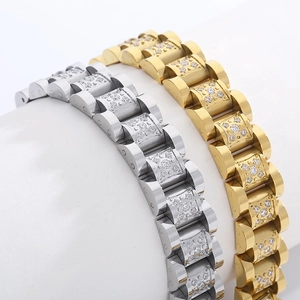 Detail of hiphop gold and silver watch-link bracelets with CNC pavé crystals