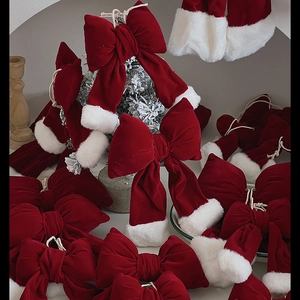 Christmas red velvet bows and mini Santa hats festive decorations for holiday trees