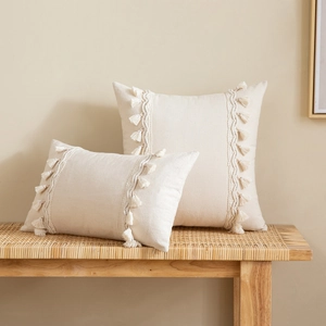 Bohemian beige tassel throw pillows on rattan bench for living room sofa decoration