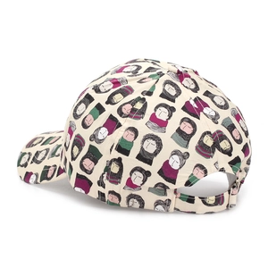 Detail of adjustable metal buckle and cartoon print on canvas baseball cap