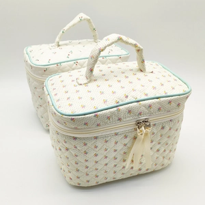Quilted floral and cherry patterns cotton cosmetic bags with handles and ribbon zippers