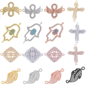 Detailed collection of micro-inlaid zircon jewelry connectors in wing and hamsa shapes