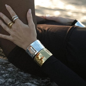 Minimalist wide hammered cuff bracelets and rings in 18K gold and silver stainless steel