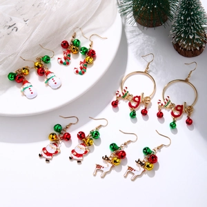 Festive Christmas alloy earrings featuring snowman, Santa, and elk on a holiday backdrop