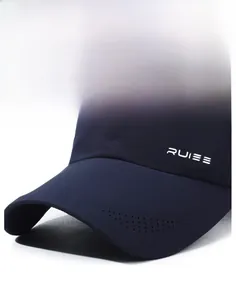 Detail of dark blue baseball cap showing laser-cut side vents and quick-dry fabric texture