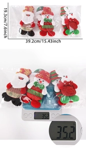 Detailed size and weight view of plush Christmas ornament set including Santa and Snowman