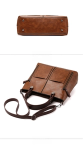 Detail view of caramel faux leather bag with bottom rivets and double side zippers