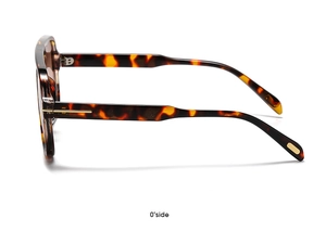 Detailansicht der Sonnenbrille in Schildpatt-Optik mit T-förmigen Metallakzenten am Bügel