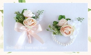 Detail of champagne silk rose boutonniere and pearl wrist corsage for wedding events