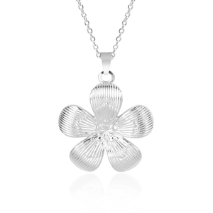 Macro shot of silver stainless steel flower pendant with textured petals and chain