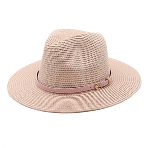 Straw Panama hat in light pink woven design with wide brim and decorative buckle band