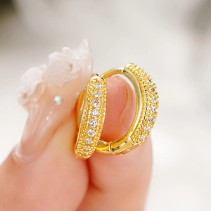 Classic gold hoop earrings for men with multi-row pavé-set clear cubic zirconia