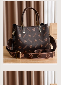 Detail of dark brown handbag with MQCKDE monogram print and wide patterned strap