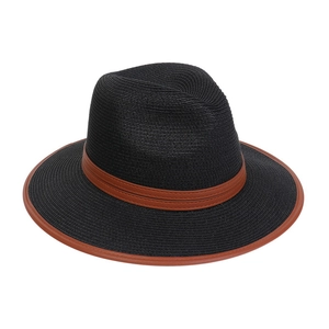 Close-up of woven straw jazz hat featuring a brown leather belt trim and brim piping