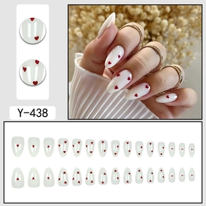30pcs minimalist almond press-on nails with white base and red heart patterns