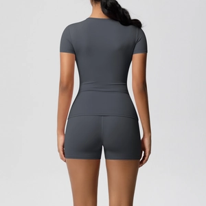 Rear view of dark grey high-elastic yoga set featuring tight fit shorts and short sleeve top