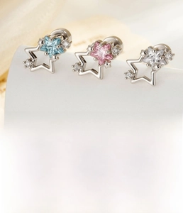 Detailed view of titanium steel star stud earrings with zirconia and size parameters