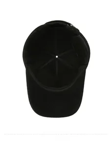 Macro view of the thick fleece lining and cross stitching inside the winter baseball cap